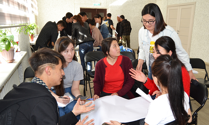 Group of young people discussing issues.