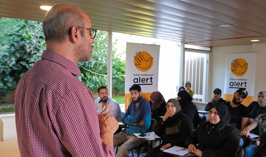 Lawyer Mohamad Araji providing tailored legal support and advice to a group.