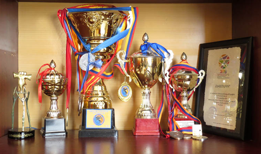 Gisha's wrestling trophies on display