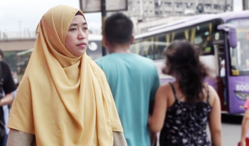 Almaira in the streets of her community 