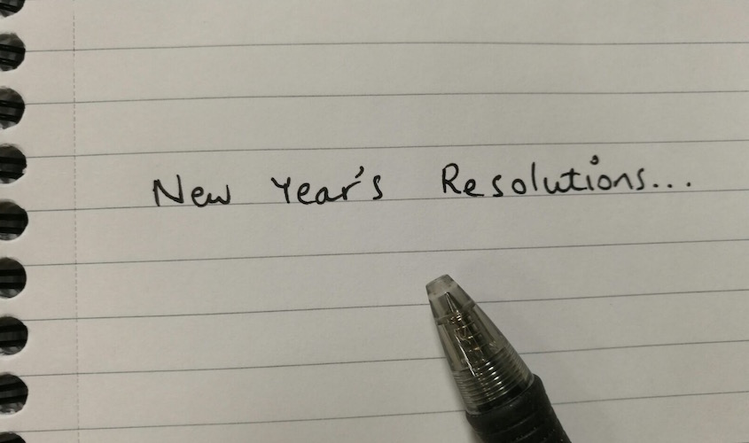 Notebook page headed New Year's Resolutions