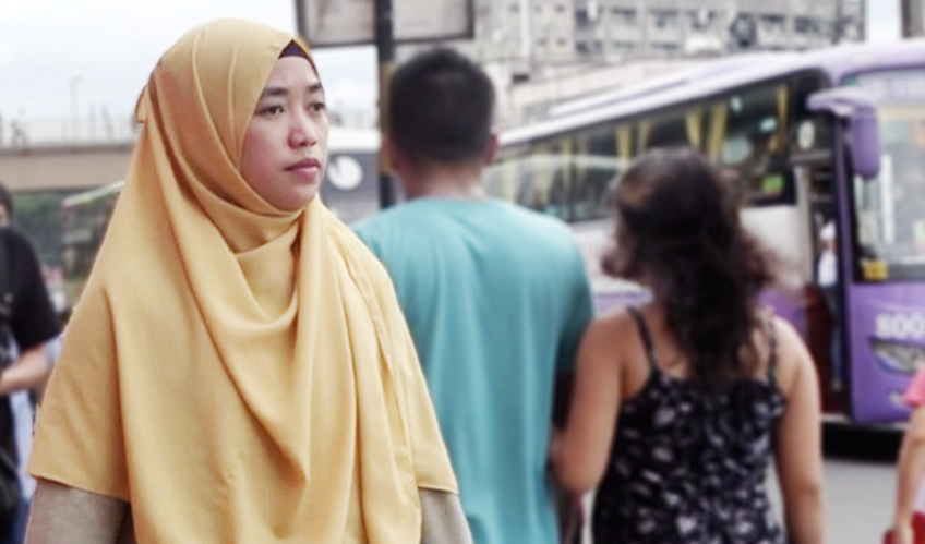 Almaira in the streets of her community